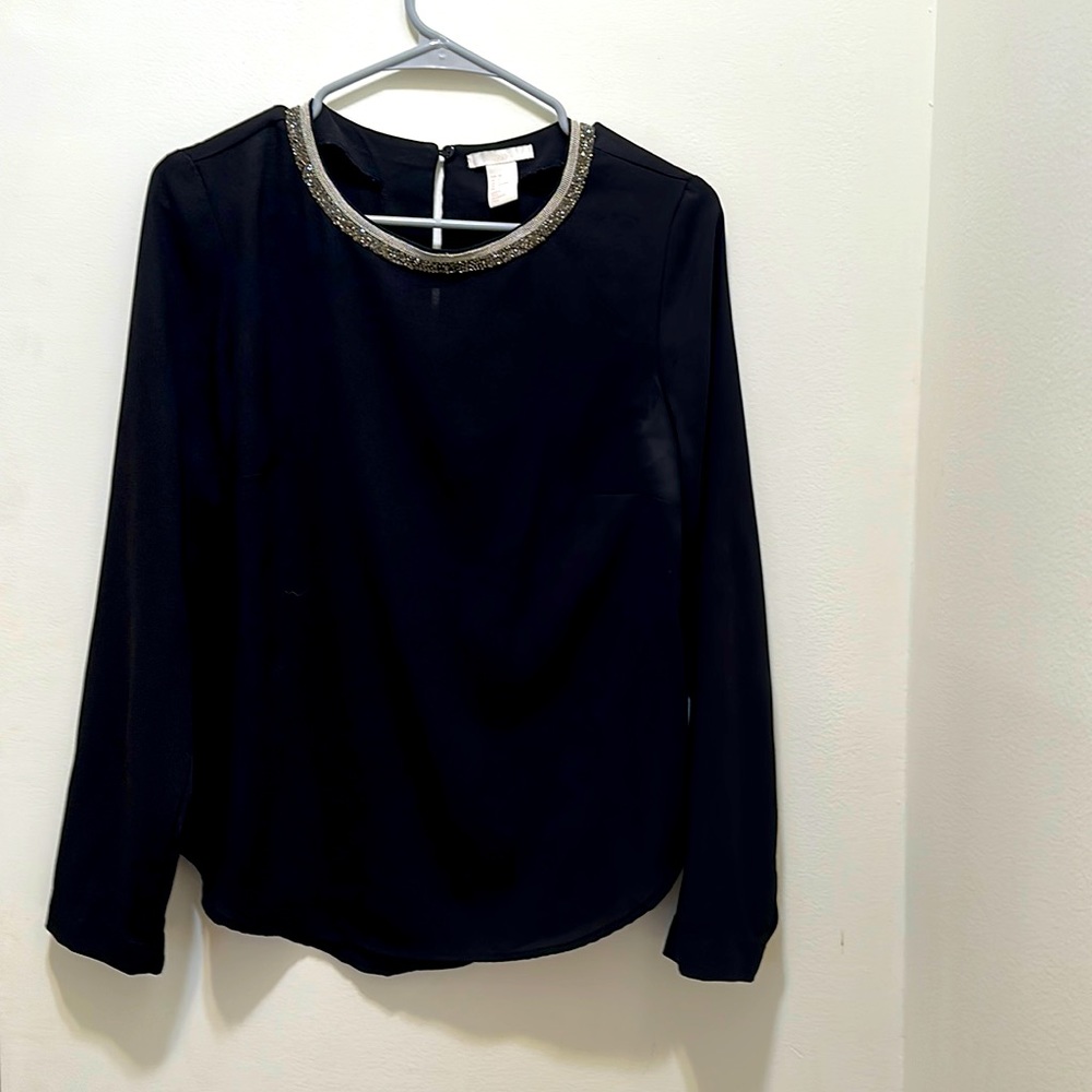 H&M black blouse with gem neckline